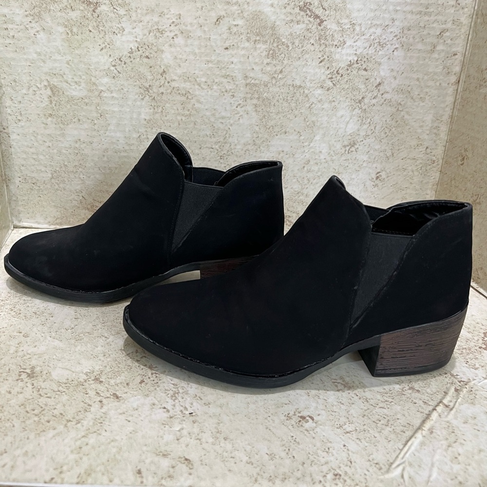 Black suede booties made‎ and purchased in Mexico size 24 which is 7 1/2 USA.